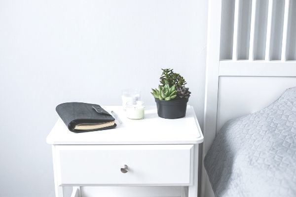 what to do at night by yourself, nightstand with journal