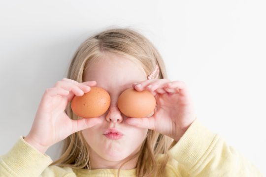 fun summer activities for kids, learning; child with eggs