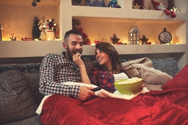 cute Christmas movies traditions for couples: watch movies for date night activities
