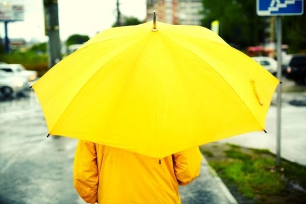 outdoor activities to do in the rain, person with umbrella