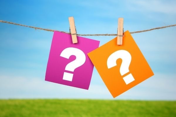 Funny rapid fire questions with two options for friends and couples: question marks hanging