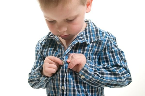 Child getting dressed: good habits for kids preschool and kindergarten