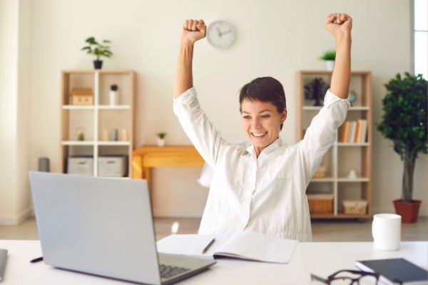 woman with hands in the air