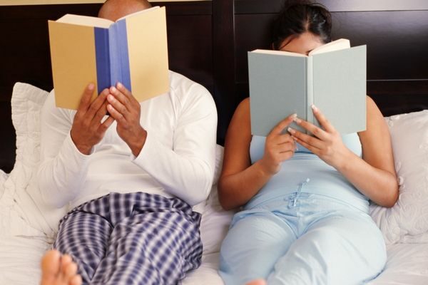 couple looking at books together