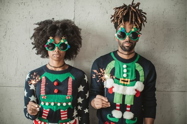 Funny adults in Xmas sweaters