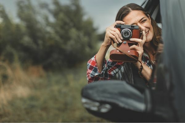 woman taking a picture; family hobby