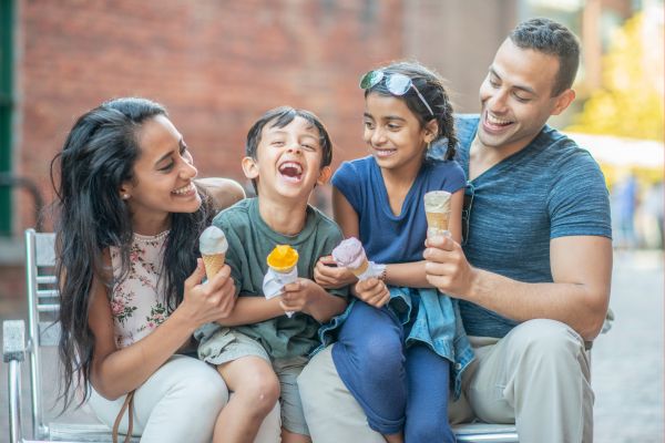 family of four eating ice cream
