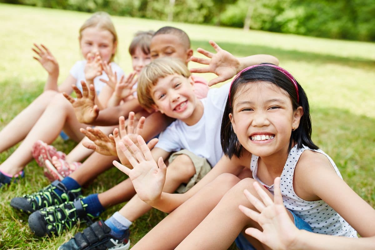 kids with hands in the air