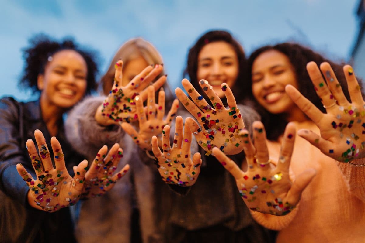 group showing glittery hands