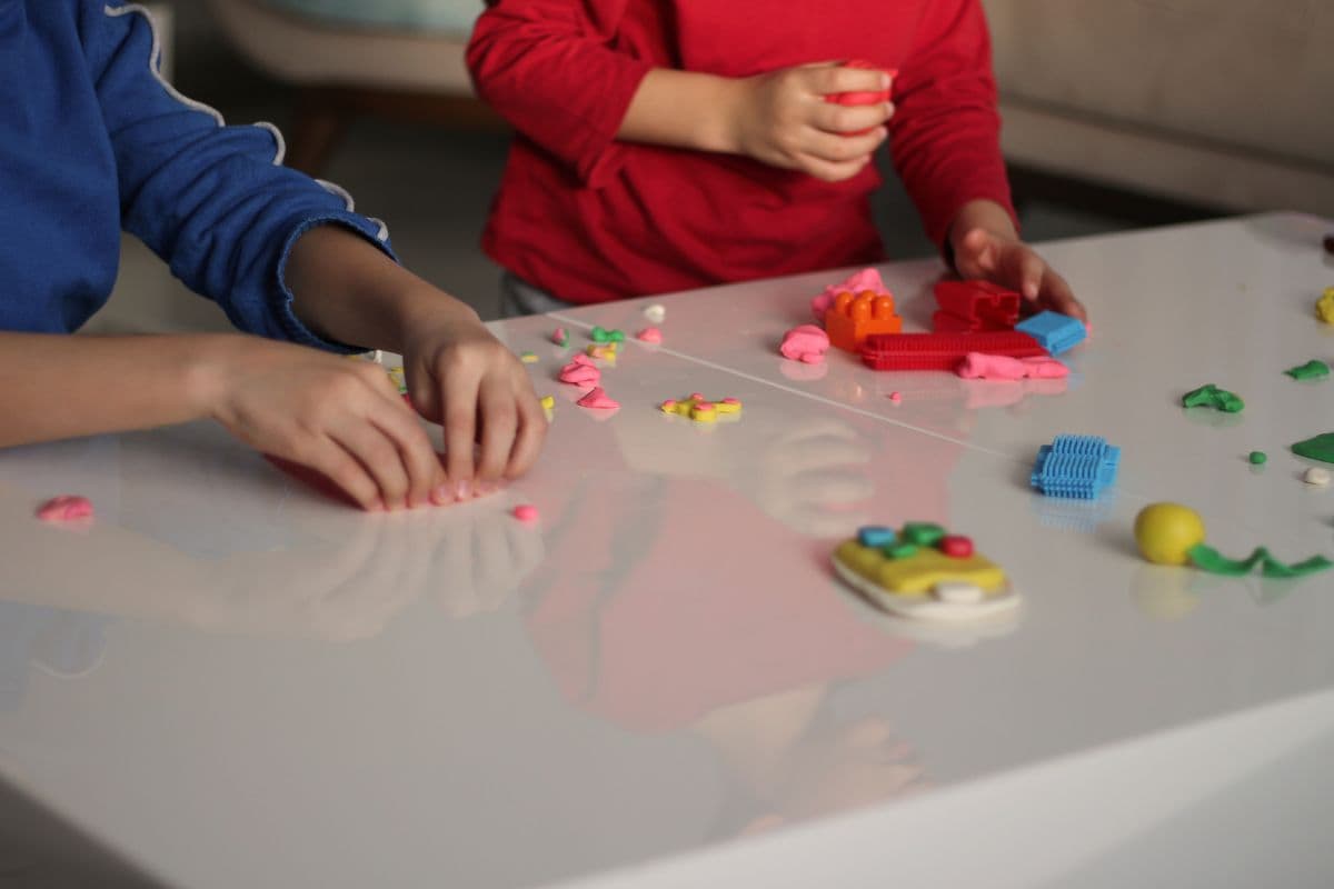 kids building with Play-Doh