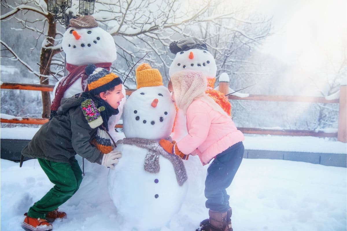 kids playing outside in snow