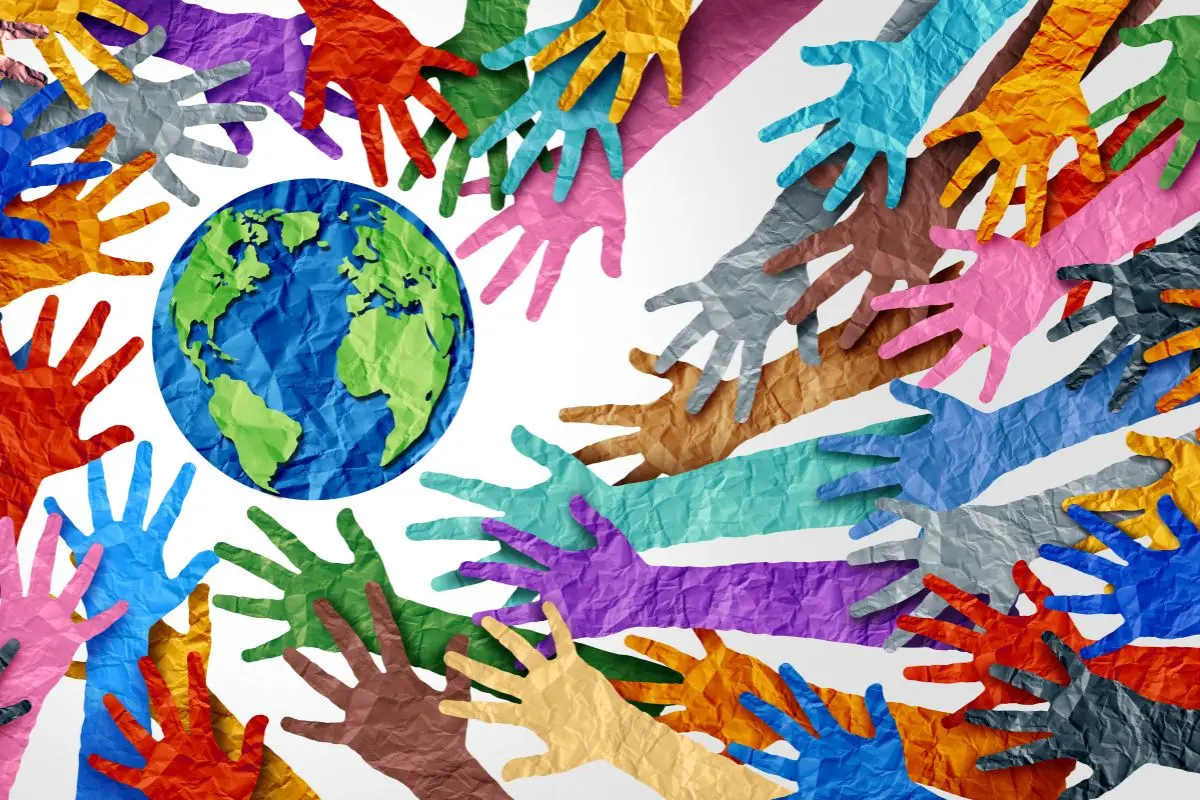 colorful hands by a planet
