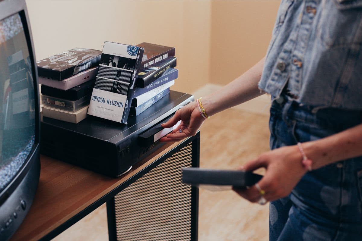 putting in a VHS tape; 90s movie trivia quiz questions