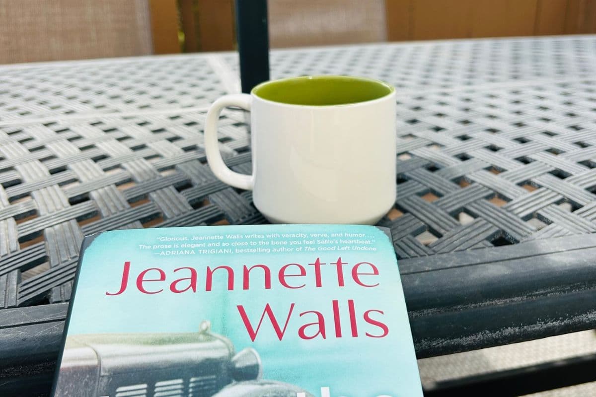 mug and book on table