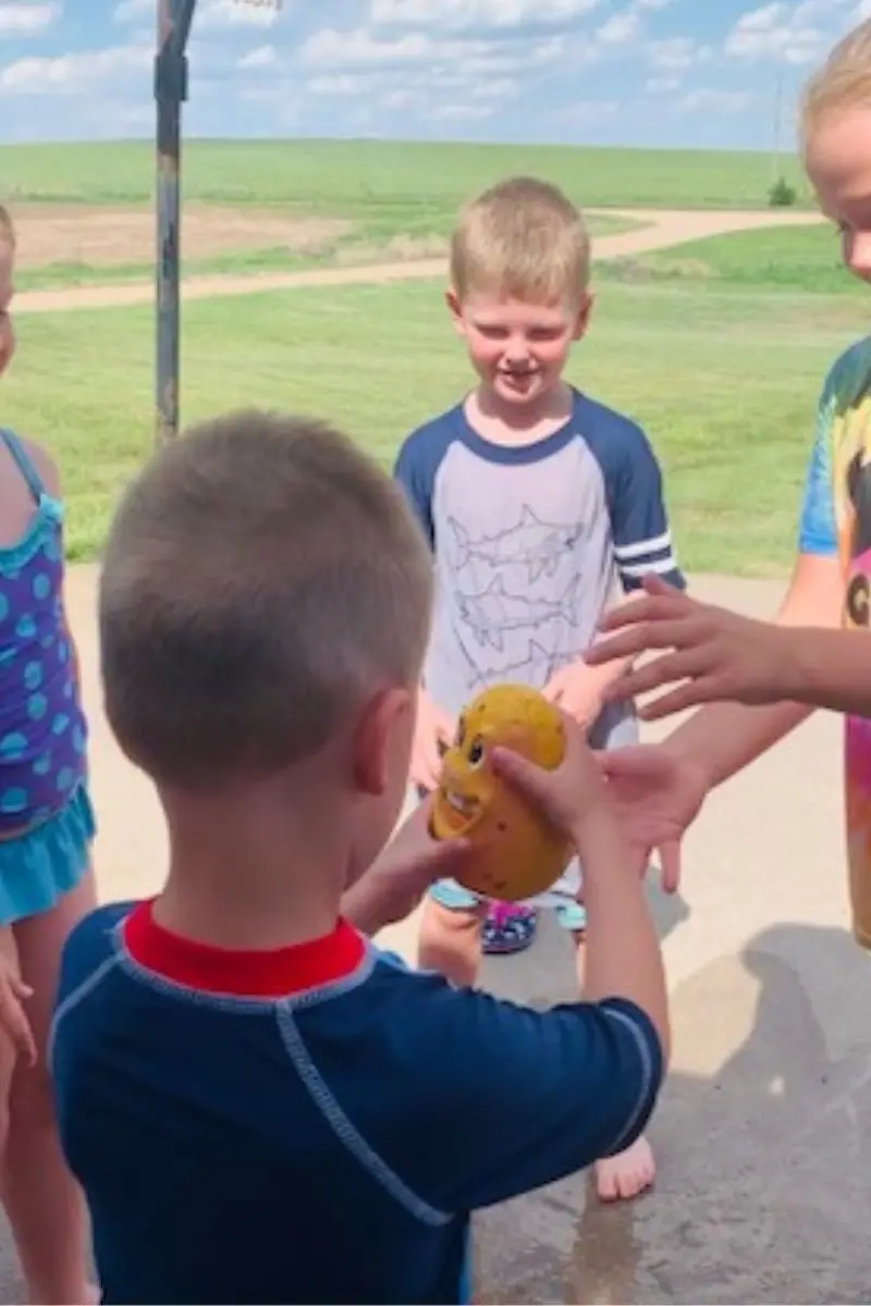 balloon water games; hot potato