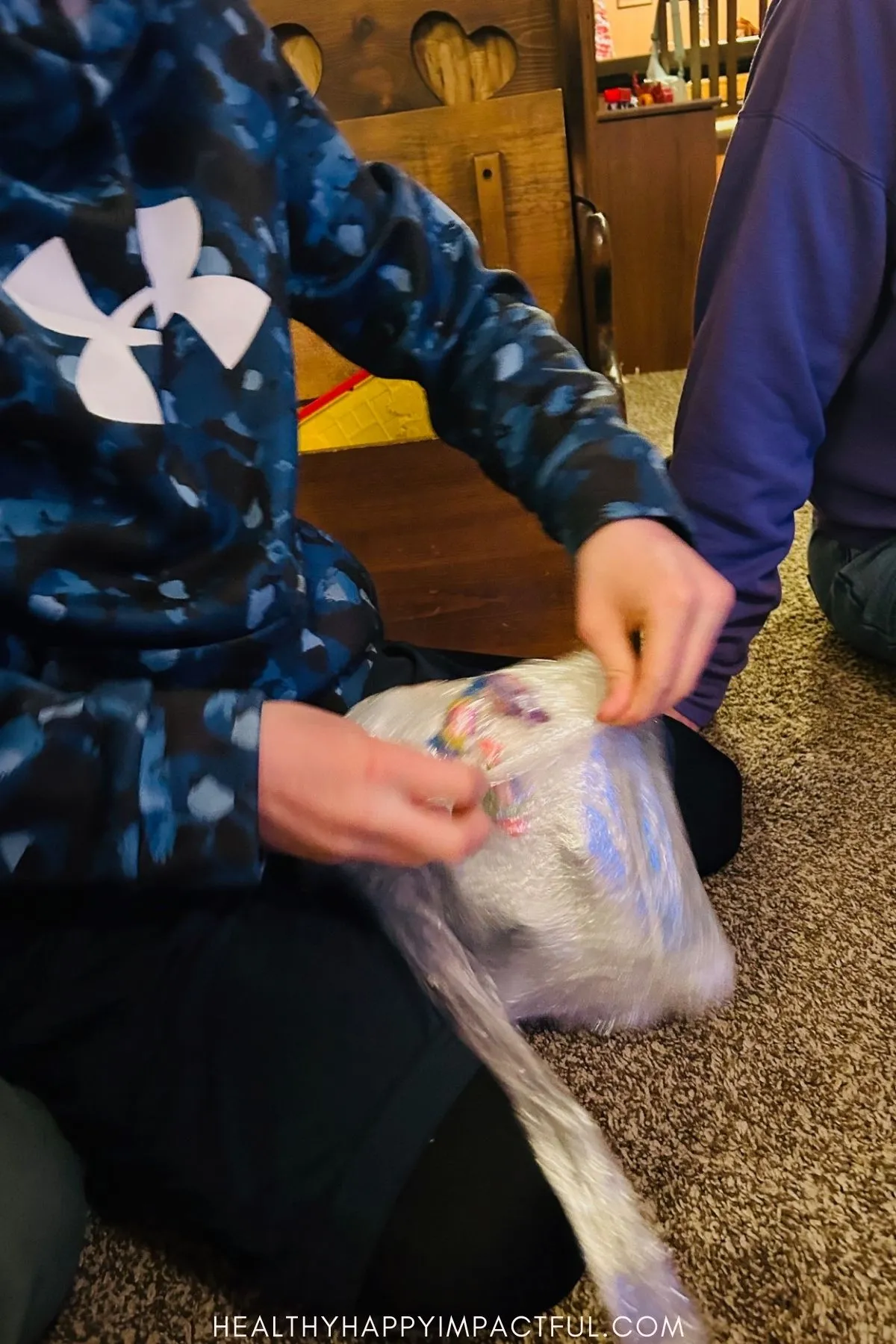 saran wrap Christmas gift exchange game