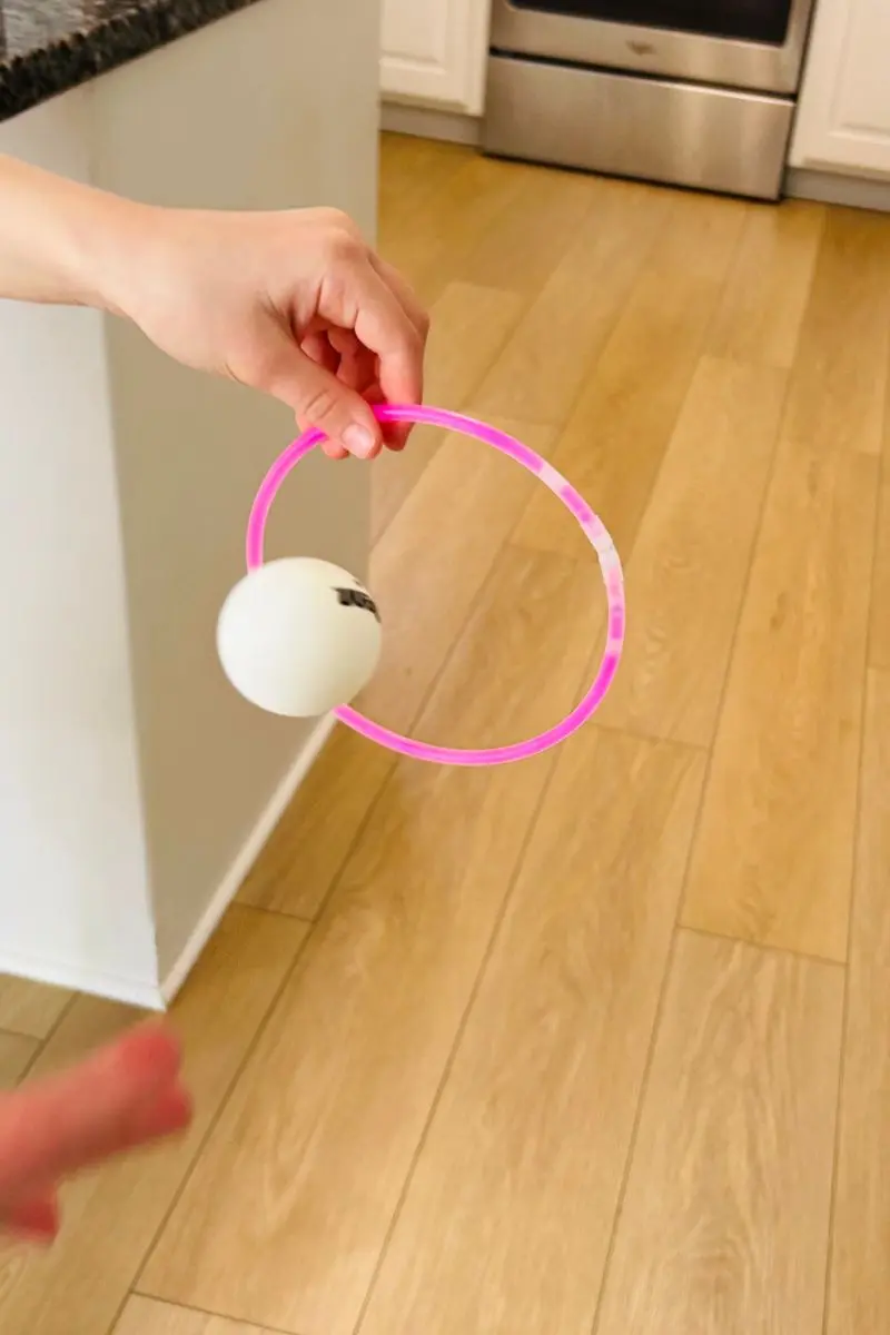 fun 4th of July games, glowing hoop toss